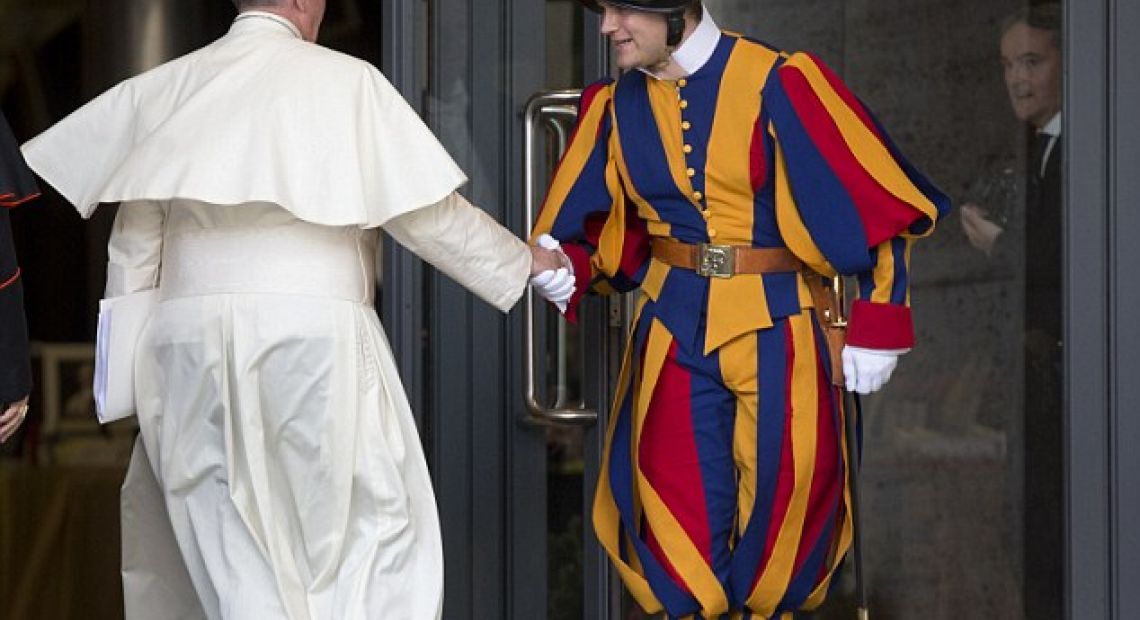 1414063340662_wps_43_Pope_Francis_greets_a_Vat.jpg
